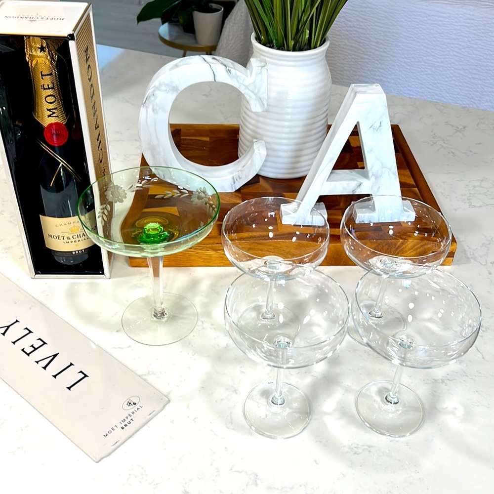 4 champagne glasses and one green large champagne/dessert platter